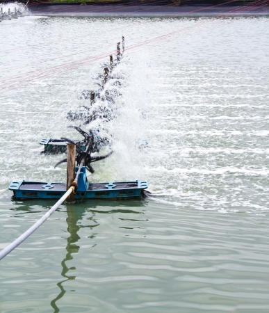 aeration turbine generate oxygen in shrimp farmの写真素材