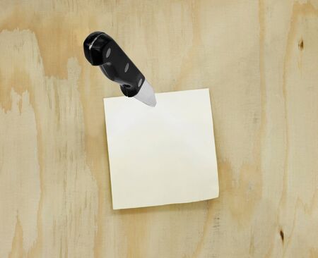 Yellow paper note on board