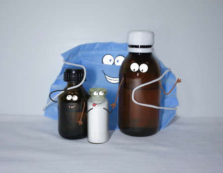friendly medicines together will help you cope with the disease, and the mask will protect you from viruses and bacteriaの写真素材