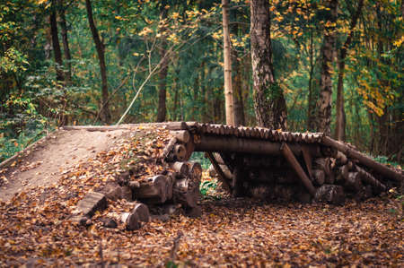 Dirt spot in the autumn forest springboard bike jumpingの写真素材
