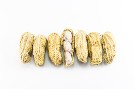 Closeup of peanuts on white backgroundの写真素材