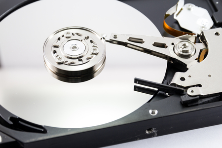 Close up inside of Harddisk on white backgroundの写真素材