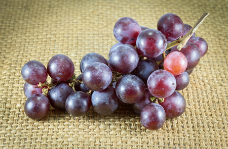 red grape on burlapの写真素材