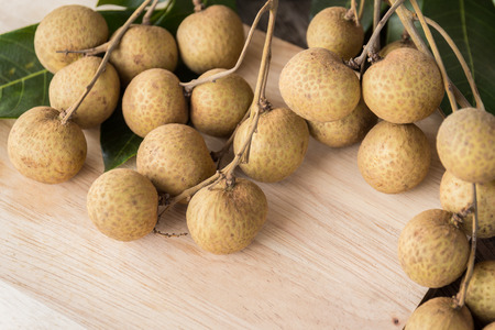 Fresh Longan on wood backgroundの写真素材