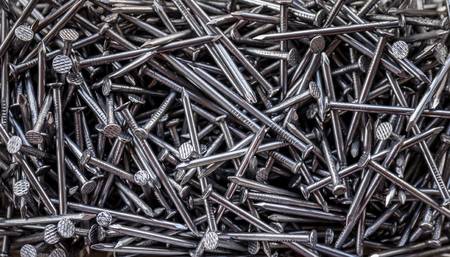 Close up of carpentry shiny nails backgroundの写真素材