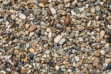 Brown pebbles stone backgroundの写真素材
