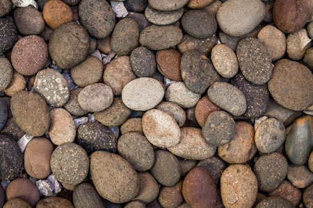 Brown pebbles stone backgroundの写真素材