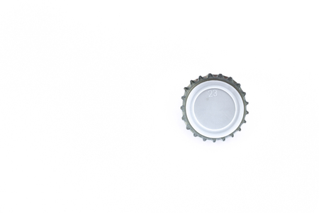 close up of a bottle cap on white background with copy spaceの写真素材