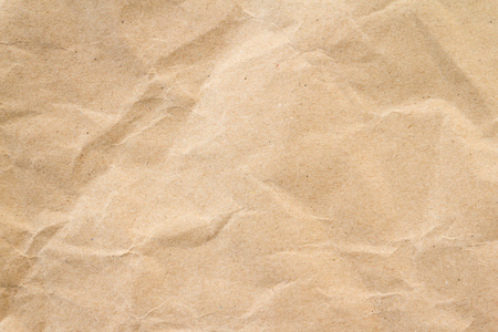 Brown wrinkle recycle paper backgroundの写真素材