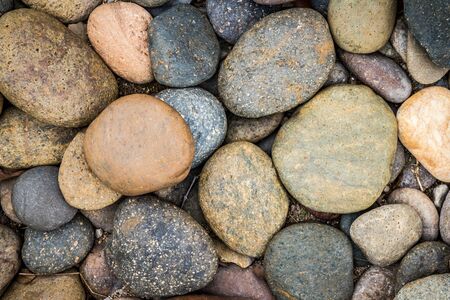 Brown Pebbles stone or river stone backgroundの写真素材