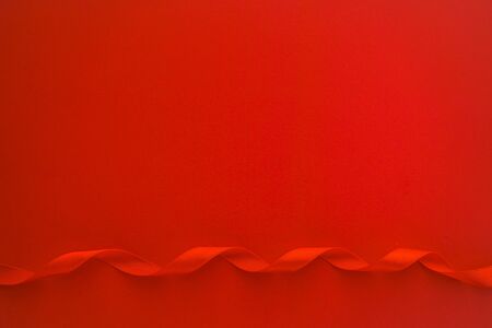 Red paper with red satin ribbon frame, Love or Gift background