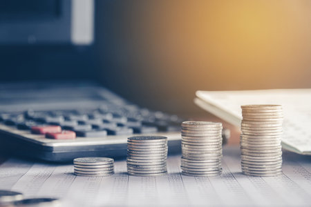 stacks of money coin background concept saving money with vintage filterの写真素材