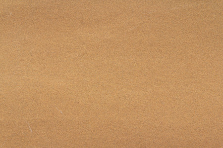 Brown Sandpaper texture can be use as backgroundの写真素材