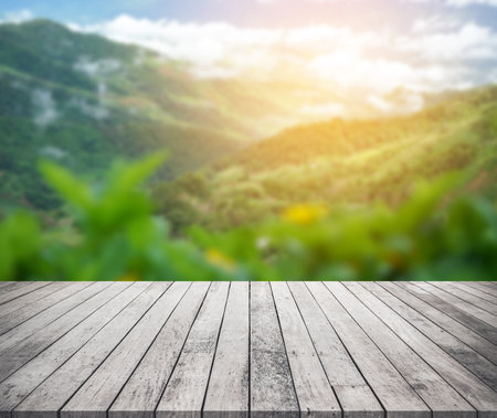 Wood desk or wood floor for product display with mountain view backgroundの写真素材