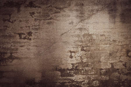 Dirty or old crack cement wall backgroundの写真素材