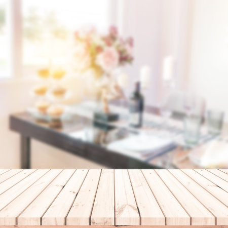 Empty wood table with blur background of dining table for products displayの写真素材