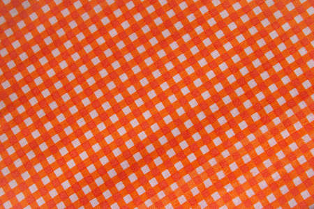 Classic orange plaid fabric or tablecloth backgroundの写真素材