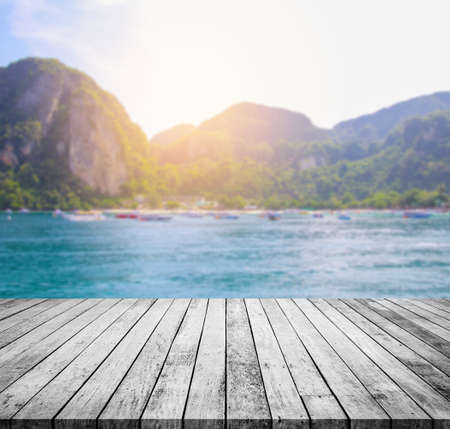 Old wood floor or wood table with sea scape islands background for product displayの写真素材
