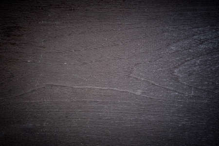 Dark brown wood texture can be use as backgroundの写真素材