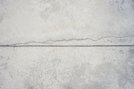 Crack raw cement or concrete floor backgroundの写真素材