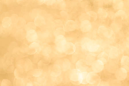Abstract orange or gold bokeh backgroundの写真素材