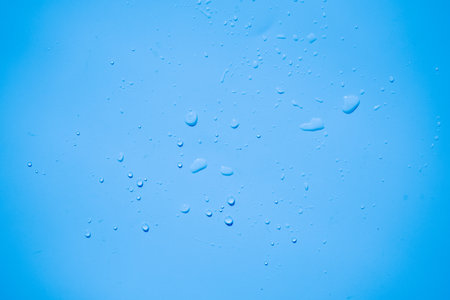Water drops on blue background, water drops on blue background, water drops on blue backgroundの写真素材