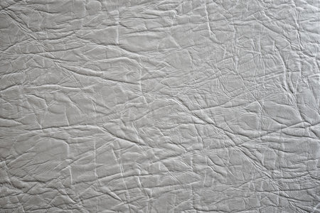Crumpled sheet of gray leather as a background. Texture.の写真素材