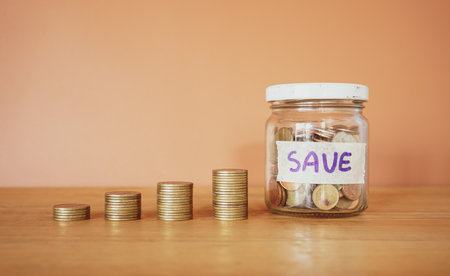 save money for investment concept money in the glass with filter effect retro vintage style