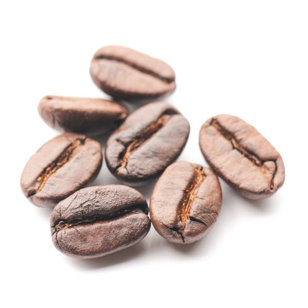Roasted coffee beans isolated on white background. Closeup image.の写真素材