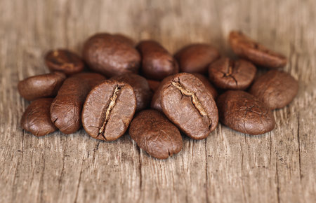 Coffee beans on wooden background. Close-up image.の写真素材