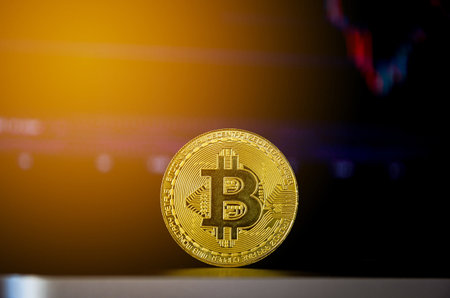 golden bitcoin on a black background. Cryptocurrency concept.の写真素材
