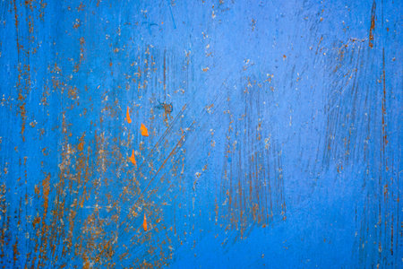 Old blue painted metal surface with rust. Abstract background and texture for design.の写真素材