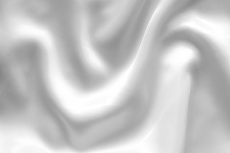 white satin texture background close up with some smooth lines in itの写真素材