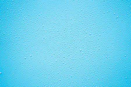 Water drops on blue background, Water drops on blue glass texture.の写真素材