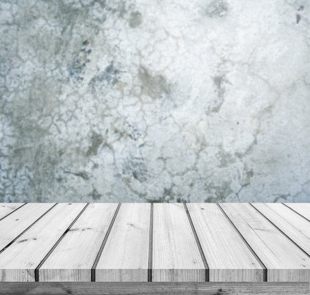 Empty wooden table over grunge wall background, product display montageの写真素材