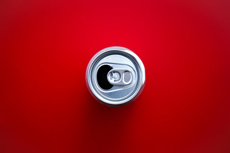 Aluminum can on red background. Top view. Copy space.の写真素材