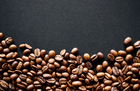 Coffee beans on black background with copy space for your textの写真素材