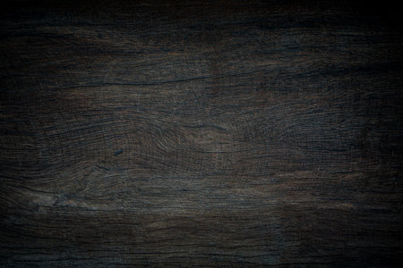 Dark wood texture background surface with old natural pattern or old wood texture table top view. Grain surface with wood texture backgroundの写真素材