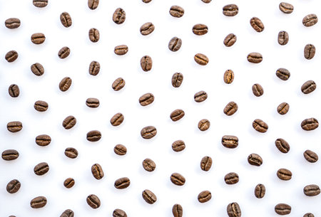 Coffee beans pattern on white background. Flat lay, top viewの写真素材