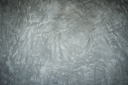 Texture of old rustic wall covered with gray stucco for backgroundの写真素材