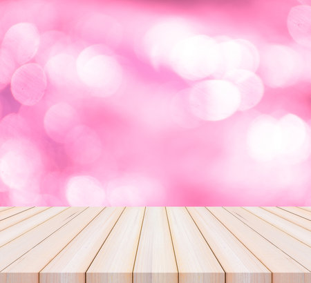 Wood table top on bokeh background - can be used for display or montage your productsの写真素材