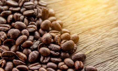 Coffee beans on wooden background with copy space for text.の写真素材