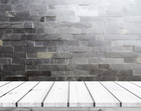 Empty wood table and brick wall background, for product display montageの写真素材