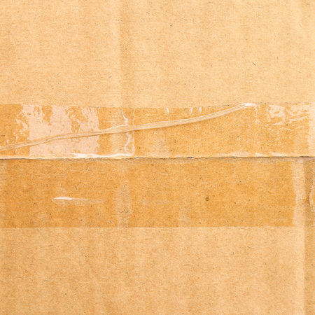 Brown corrugated cardboard sheet useful as a background - vintage effectの写真素材