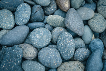 Pebbles background. Close up of blue sea pebbles.の写真素材