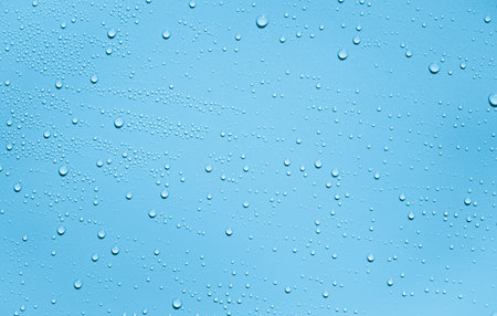 Water drops on a blue background. Water drops on a blue background.の写真素材