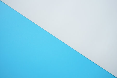 Blue and white color paper background. Copy space for your text.の写真素材