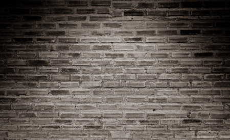 Black and white brick wall texture background. Vintage tone filter effect color style.の写真素材