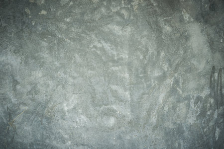 Texture of old rustic wall covered with gray stucco for backgroundの写真素材
