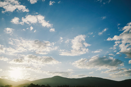 Beautiful sunset over the mountains. Nature background. Toned.の写真素材